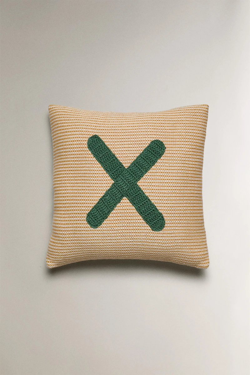 COUSSIN ENFANT BRODÉ LETTRE X
