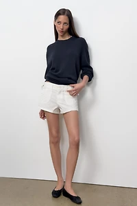 SHORT À POCHES ET CORDONS