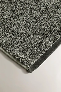 BATH TOWEL WITH A MELANGE-EFFECT