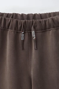 SPORTY CONTRAST PIPING TROUSERS