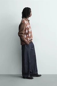 KNIT LOZENGE PATTERN POLO WITH DISTRESSED EFFECT