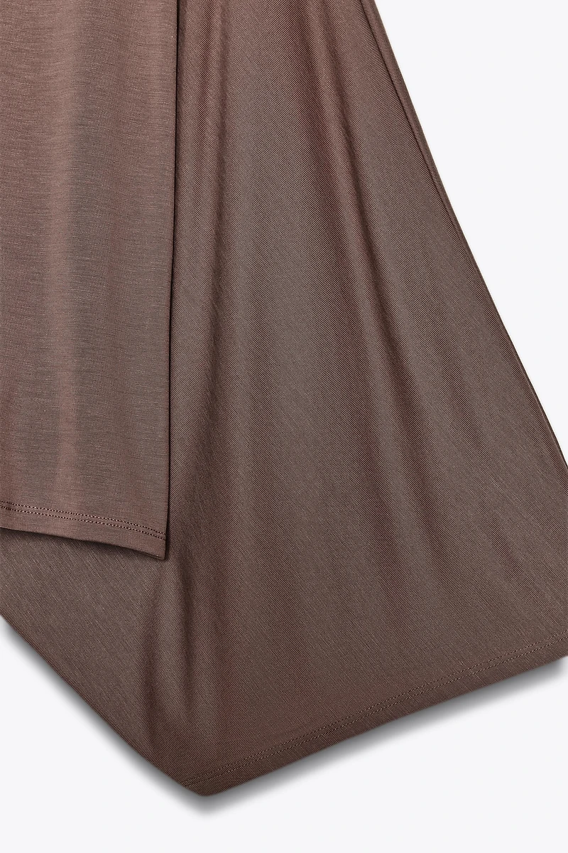 ASYMMETRIC FLOWY CAPE