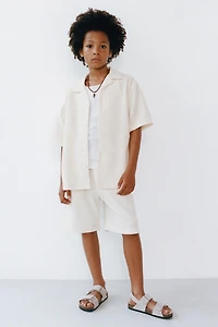 SLIM FIT TEXTURED TOWEL SHORTS