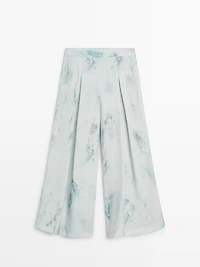 Printed trousers with pleat details