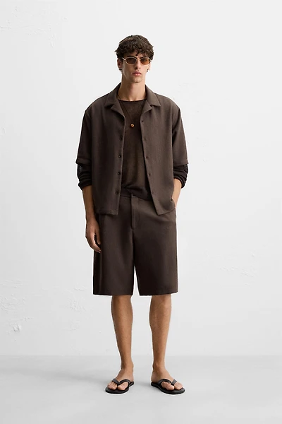 TEXTURED PLEATED SHORTS