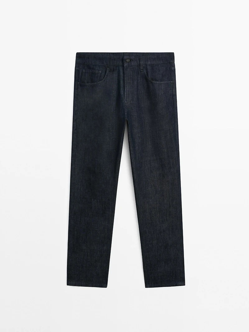 Cotton blend tapered fit jeans