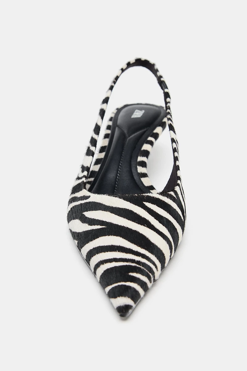 CHAUSSURES EN CUIR À IMPRIMÉ ANIMALIER