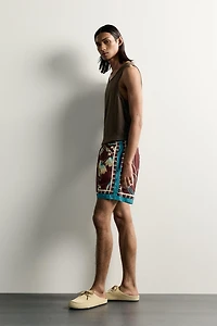 LIMITED EDITION MIXED PRINT SWIM SHORTS