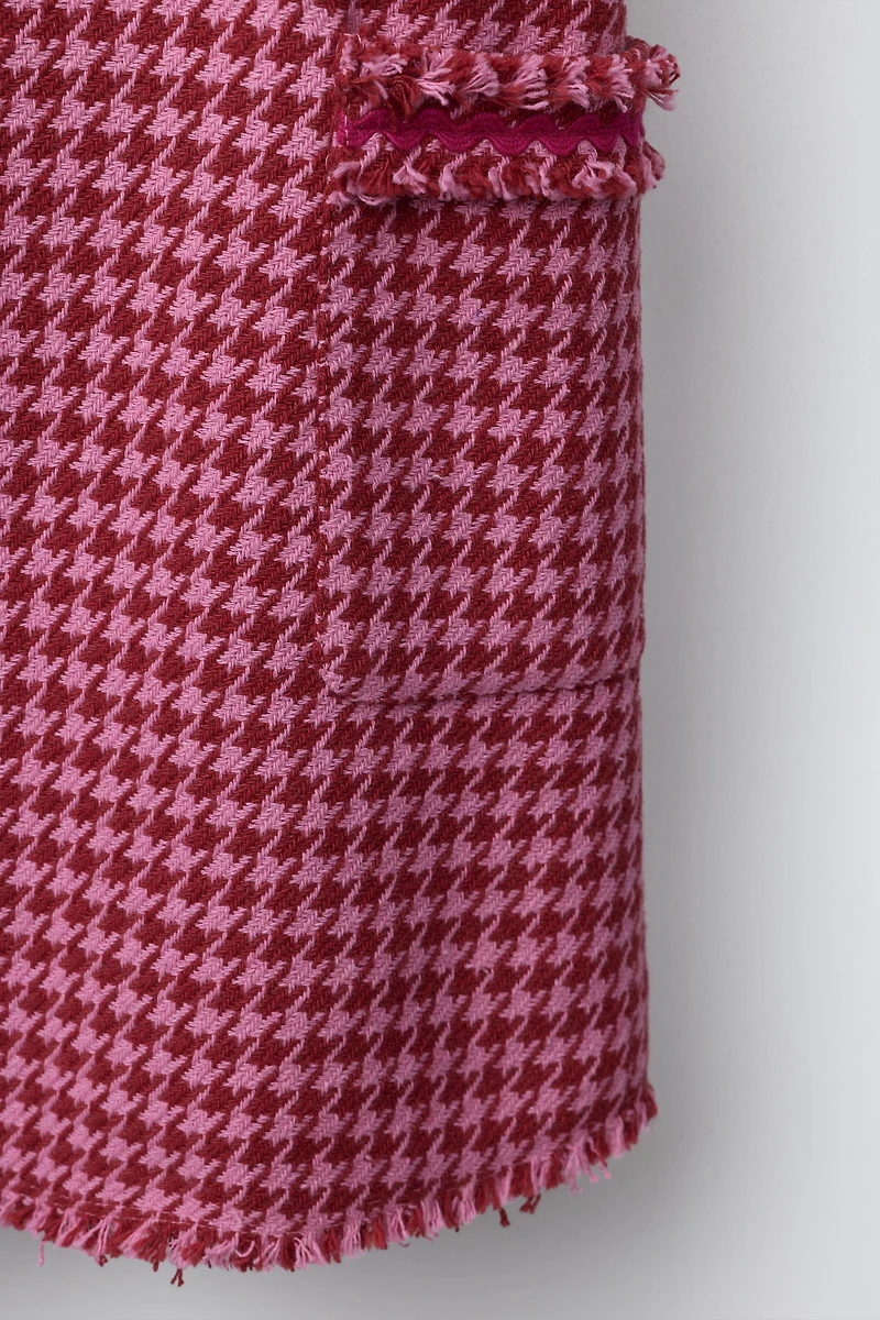 ROBE-SALOPETTE STRUCTURÉE EFFRANGÉE