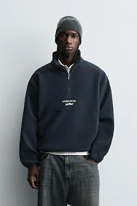 EMBROIDERED QUARTER-ZIP FLEECE SWEATSHIRT
