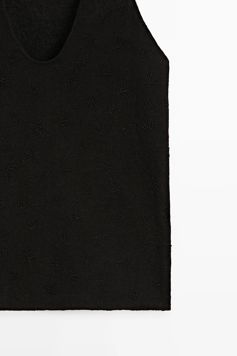 Flowing top with embroidery