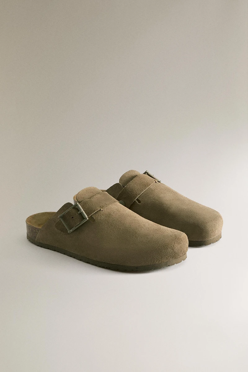 LEATHER MULE CLOG SLIPPERS WITH BUCKLE AND TOPSTITCHING DETAIL