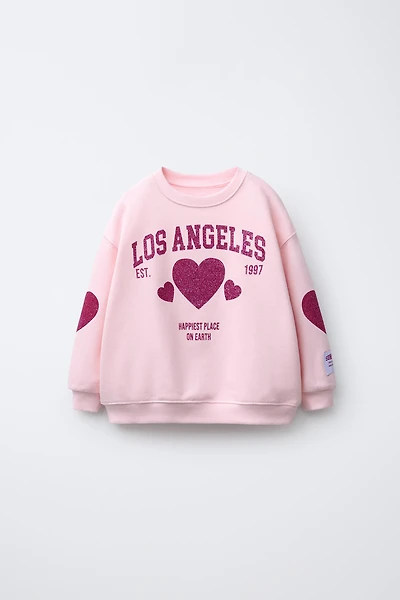 CITY GLITTER SWEATSHIRT