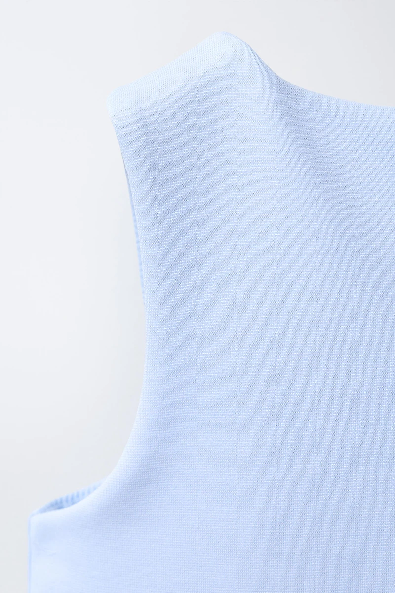 GILET BOUTON BIJOU