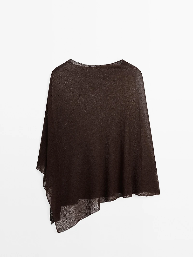 Cape en maille coupe asymétrique