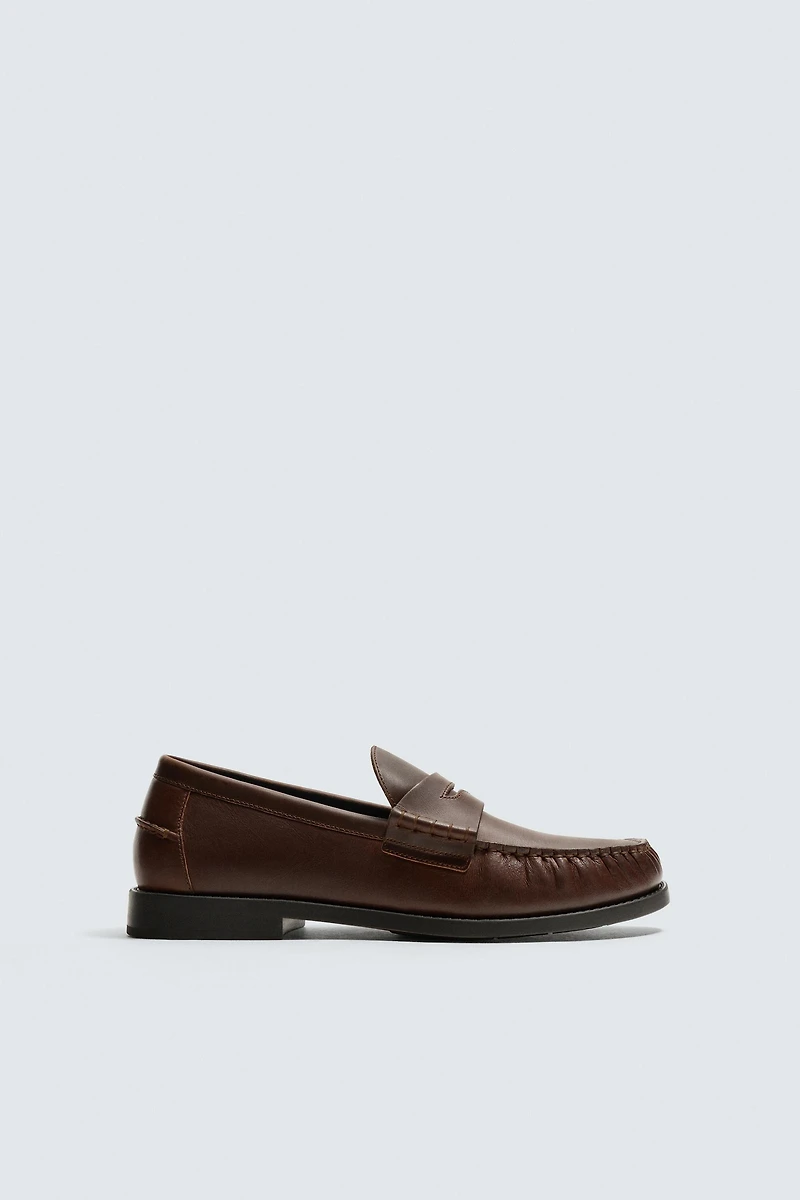 MOCASSINS EN CUIR À MASQUE