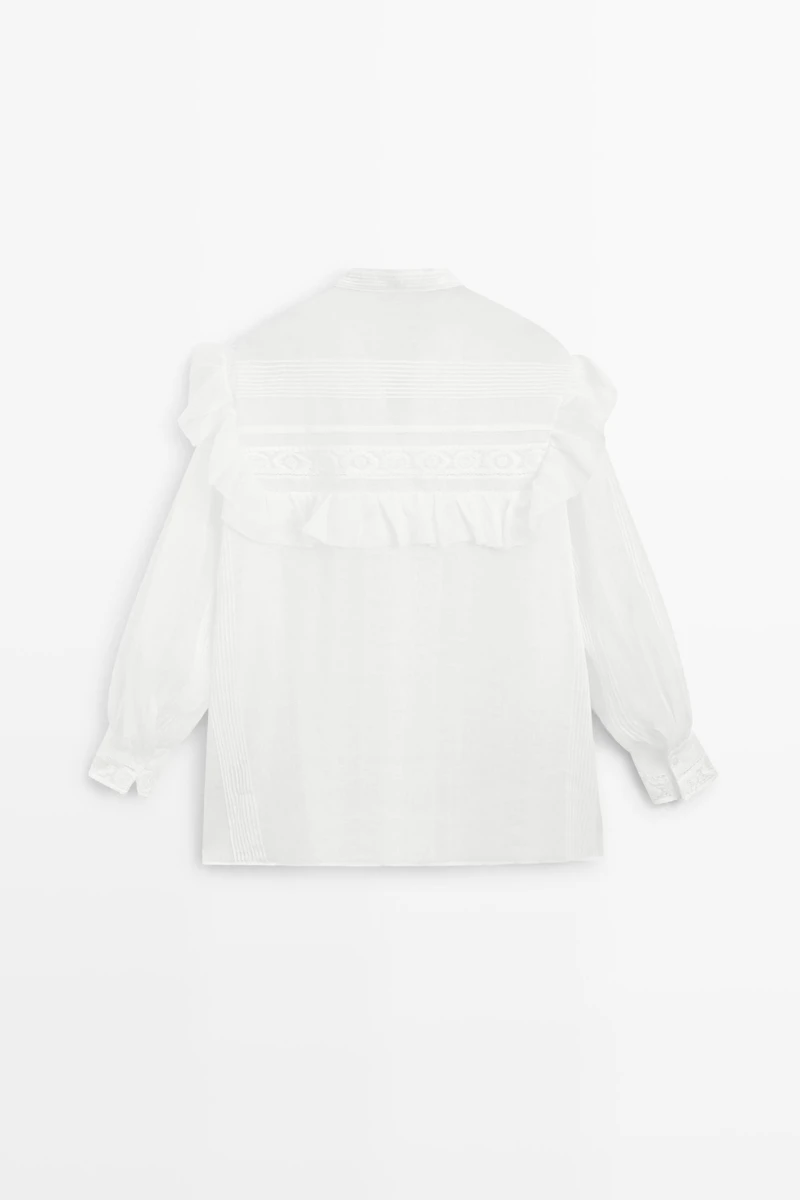 Stand collar blouse with embroidery and ruffles
