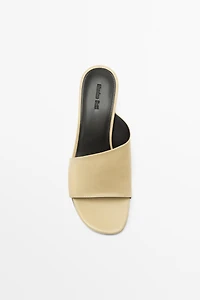 Sandale compensée en cuir souple