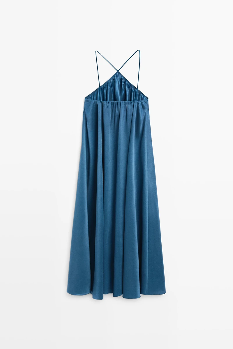 Long flowing dress with criss-cross straps