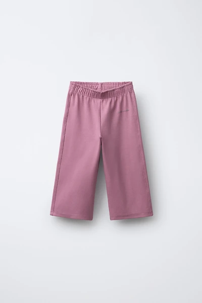 WIDE LEG RAISED TEXT PLUSH PANTS