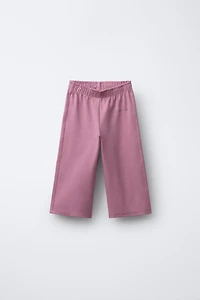 WIDE LEG RAISED TEXT PLUSH PANTS