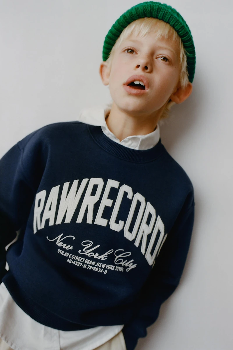PLUSH TEXT SWEATSHIRT