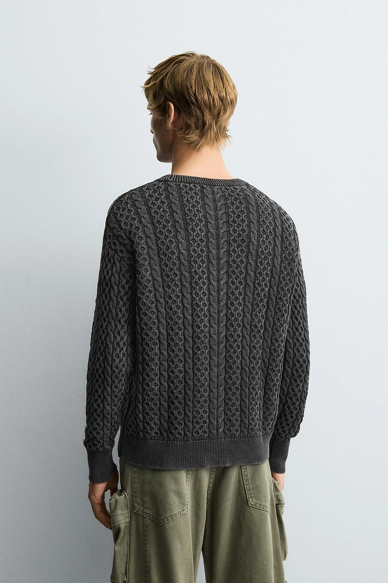 GARMENT-DYED CABLE KNIT SWEATER