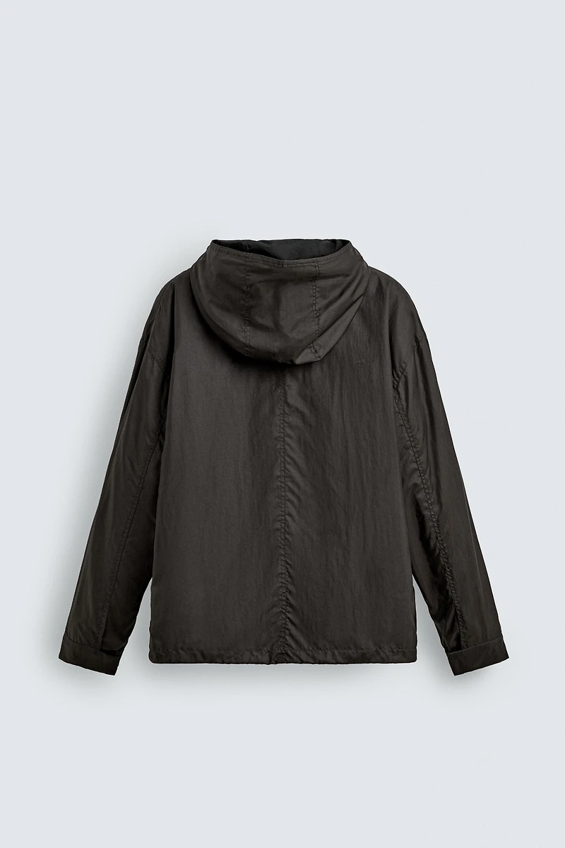 BLOUSON TECHNIQUE À CAPUCHE