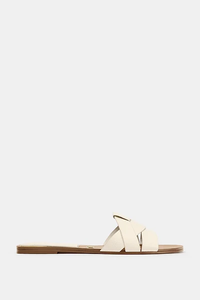 FLAT CROSSED LEATHER SANDALS