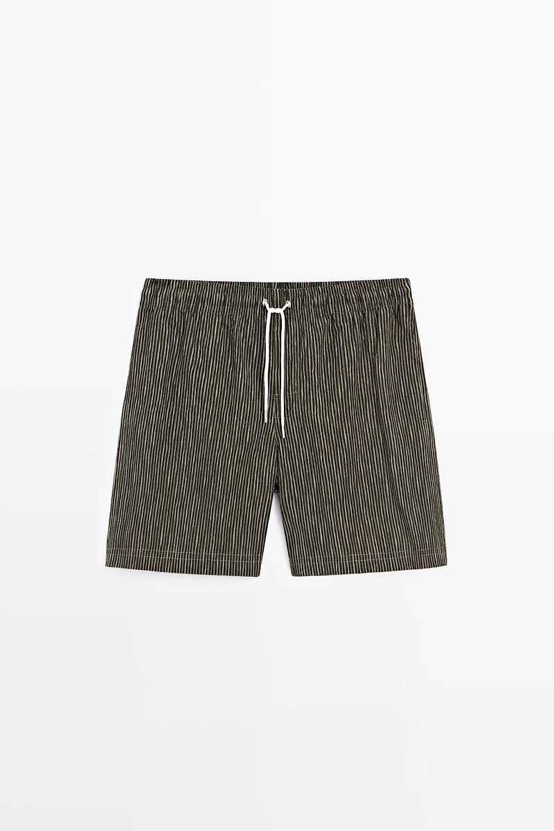 Striped print swimming trunks