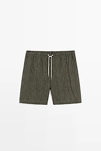 Striped print swimming trunks