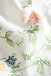 LOT DE 2 SERVIETTES DE TABLE JACQUARD ET IMPRIMÉ FLORAL