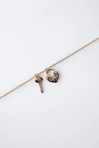 PACK OF TWO FLOCKED RABBIT AND PADLOCK NECKLACES