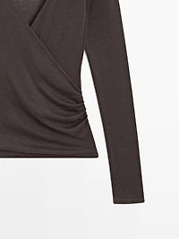 Lyocell and wool top with surplice neckline