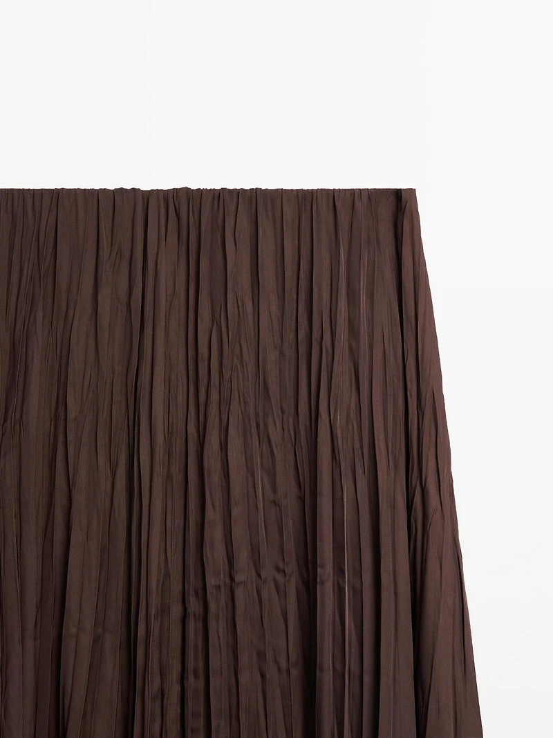 Long flowing pleated skirt