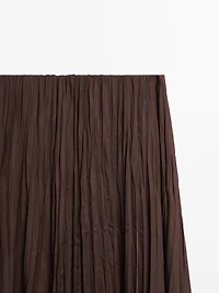 Long flowing pleated skirt