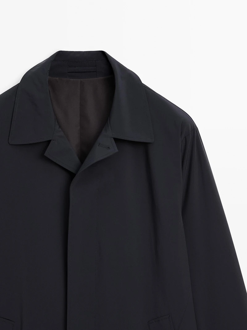 Lightweight trench coat with hidden buttons