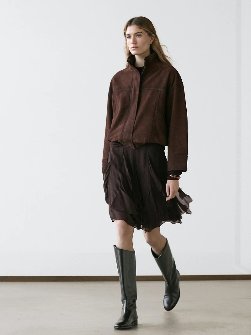 Asymmetric skirt with ruffles