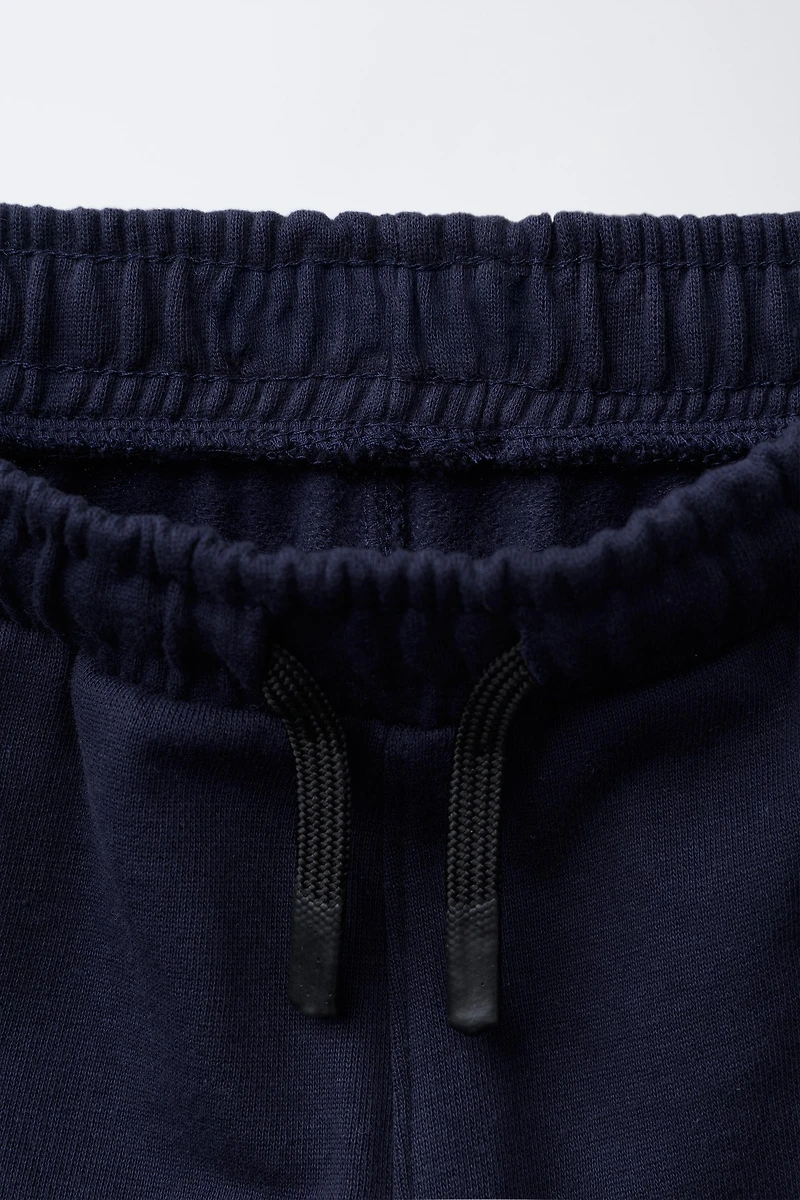 PANTALON DE JOGGING AVEC INSCRIPTION IMPRIMÉE