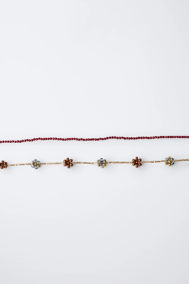 TWO-PACK OF BEADED FLOWER NECKLACES