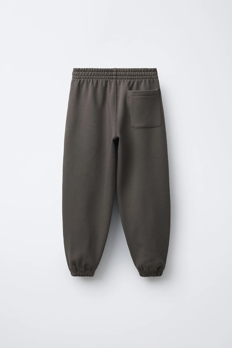 TEXT PRINT BALLOON PLUSH PANTS