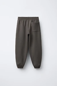 TEXT PRINT BALLOON PLUSH PANTS