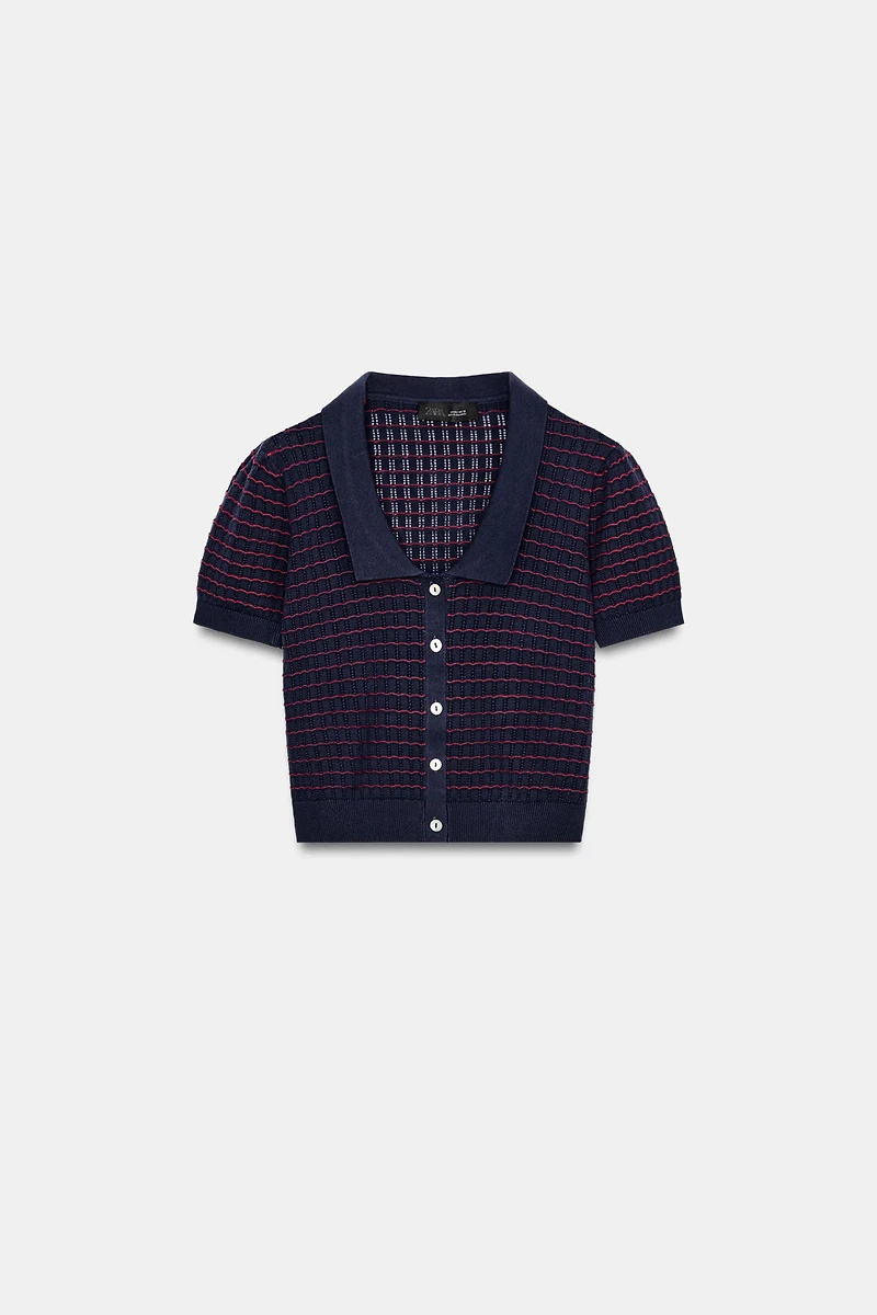 GILET EN MAILLE À COL CLAUDINE ET MANCHES COURTES