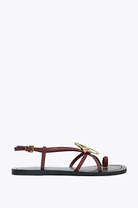 STRAPPY SANDALS WITH METALLIC DETAIL