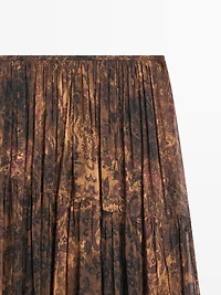 Flowing asymmetric midi skirt