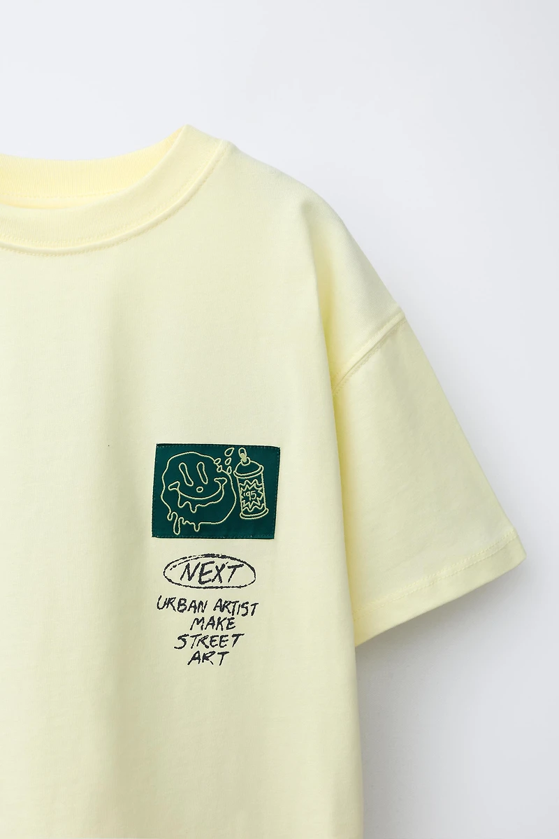 T-SHIRT IMPRIMÉ GRAFFITI