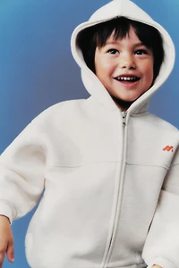 EMBOSSED LOGO ZIP-UP HOODIE