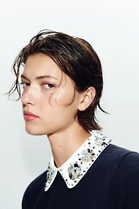 POLO EN MAILLE À FANTAISIE BIJOUX