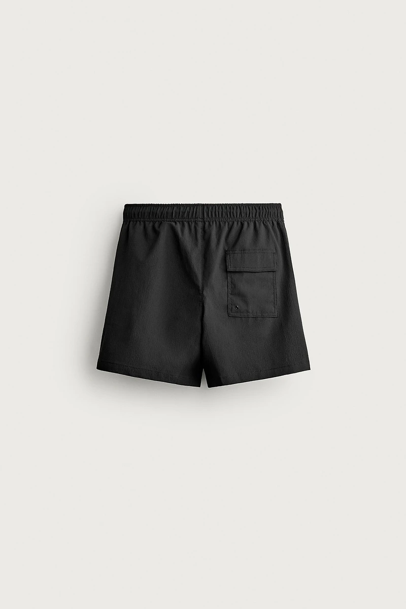 TEXTURED MID-LENGTH SWIMSUIT