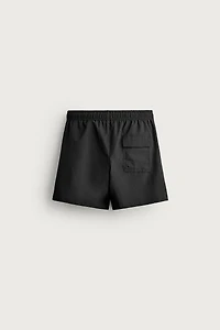 TEXTURED MID-LENGTH SWIMSUIT